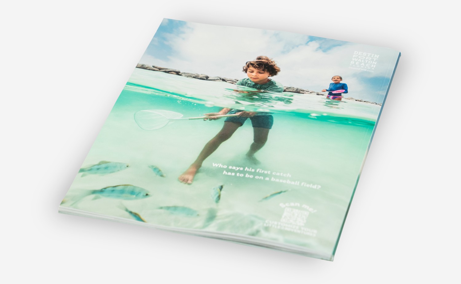 The back of the soft touch cover on the magazine. Featuring a kid fishing with a net.
