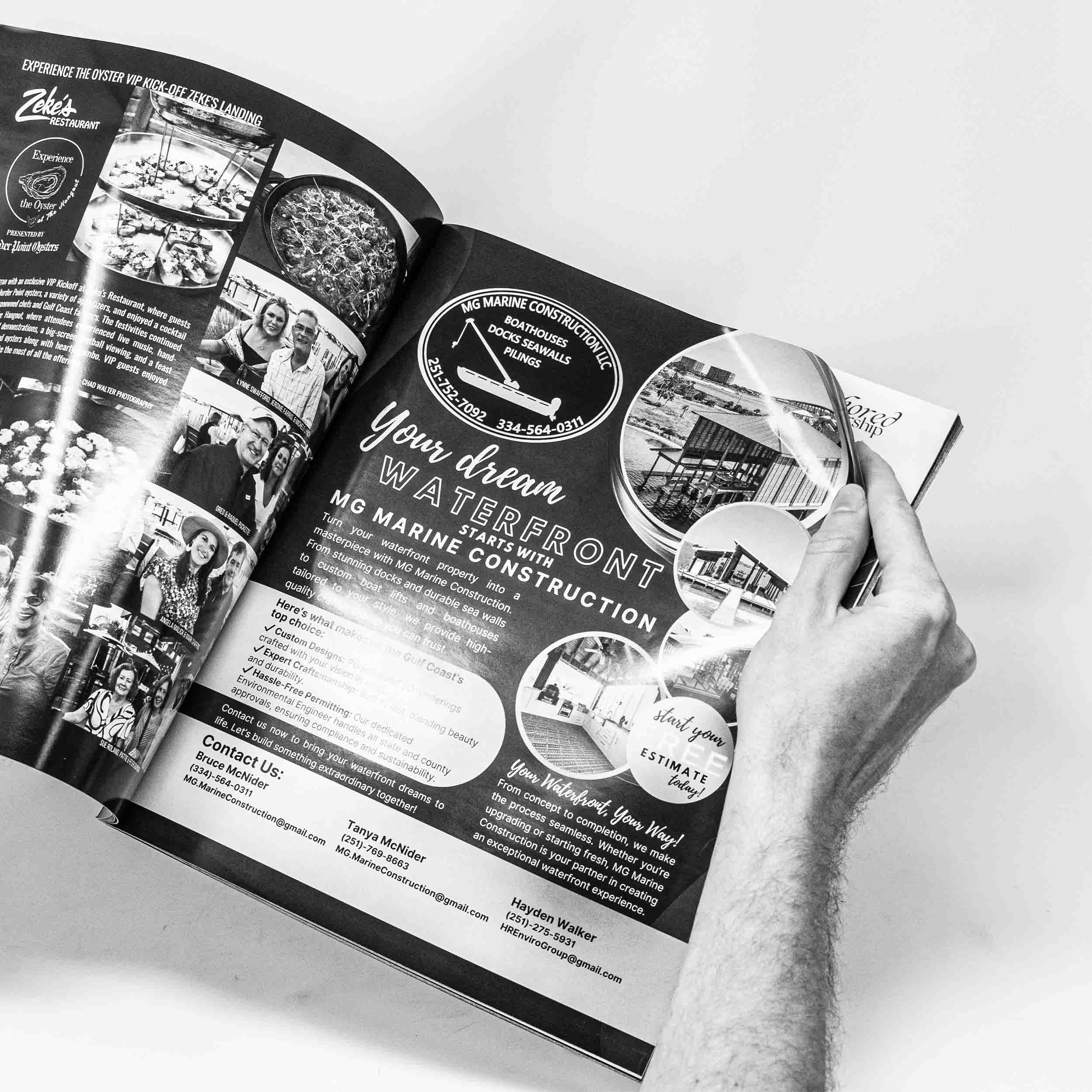 Hands holding multiple magazines